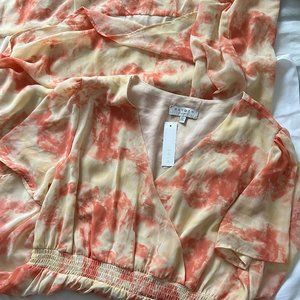 Short sleeved, flowy, tiered summer dress
